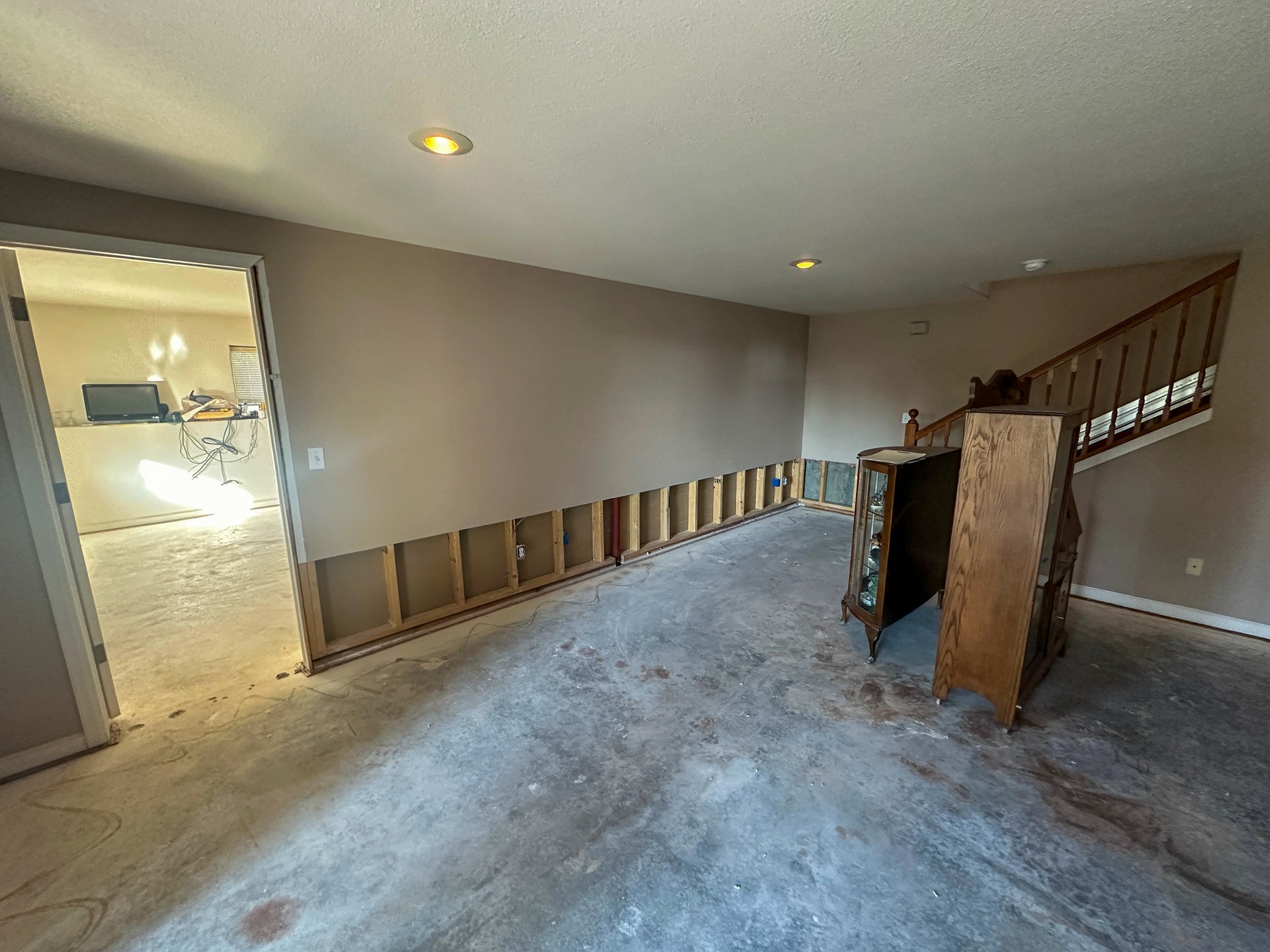 An after photo of a basement that had a water loss showing a flood cut